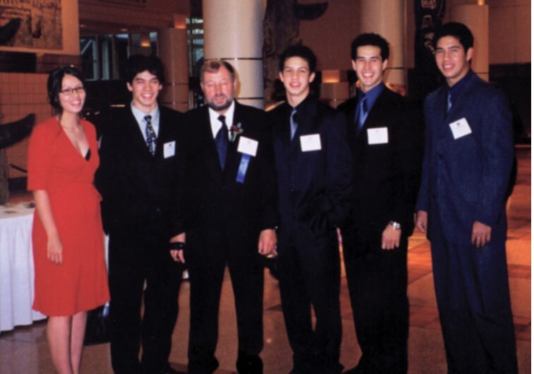 Isidor is flanked by his sons and daughter. The photo was taken at the Entrepreneur Award ceremony at Vancouver's Pan Pacific Hotel (2001)